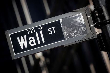A street sign for Wall Street is seen in the financial district in New York, U.S., November 8, 2021. REUTERS/Brendan McDermid A street sign for Wall Street is seen in the financial district in New York, U.S., November 8, 2021. REUTERS/Brendan McDermid