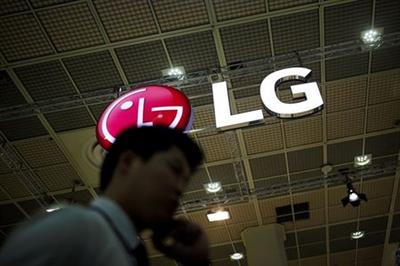FILE PHOTO: A man talking on his phone walks past the logo of LG Electronics during Korea Electronics Show 2016 in Seoul, South Korea, October 27, 2016. REUTERS/Kim Hong-Ji/File Photo FILE PHOTO: A man talking on his phone walks past the logo of LG Electronics during Korea Electronics Show 2016 in Seoul, South Korea, October 27, 2016. REUTERS/Kim Hong-Ji/File Photo