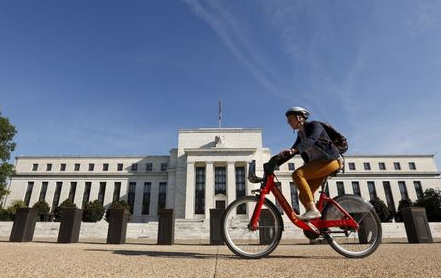 A cyclist passes the Federal Reserve headquarters in Washington September 16, 2015. The Federal Reserve, facing this week its biggest policy decision yet under Chair Janet Yellen, puts its credibility on the line regardless of whether it waits or raises interest rates for the first time in nearly a decade. REUTERS/Kevin Lamarque A cyclist passes the Federal Reserve headquarters in Washington September 16, 2015. The Federal Reserve, facing this week its biggest policy decision yet under Chair Janet Yellen, puts its credibility on the line regardless of whether it waits or raises interest rates for the first time in nearly a decade. REUTERS/Kevin Lamarque