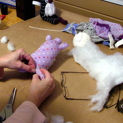 step 9 sewing and stuffing the legs.jpg