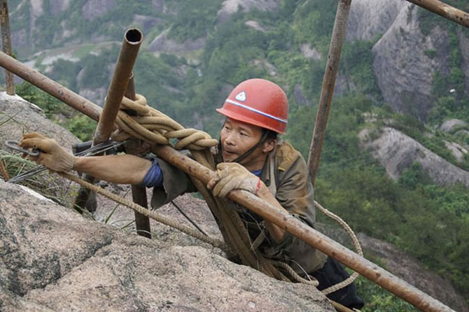 Как строят экскурсионные дороги в горном Китае