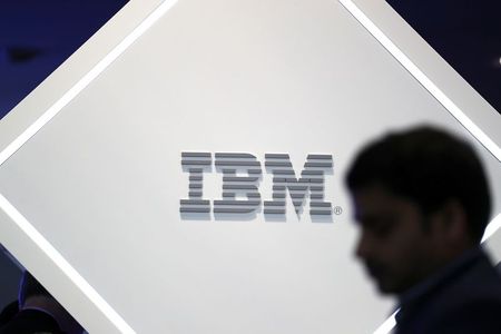 A man stands near an IBM logo at the Mobile World Congress in Barcelona, Spain, February 25, 2019. REUTERS/Sergio Perez