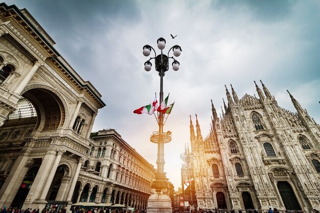 Beautiful panoramic view of duomo square in milan with big stree Free Photo