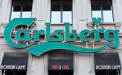 FILE PHOTO: A logo of Carlsberg beer is seen on the entrance of a pub in Brussels, Belgium March 10, 2016. REUTERS/Yves Herman FILE PHOTO: A logo of Carlsberg beer is seen on the entrance of a pub in Brussels, Belgium March 10, 2016. REUTERS/Yves Herman