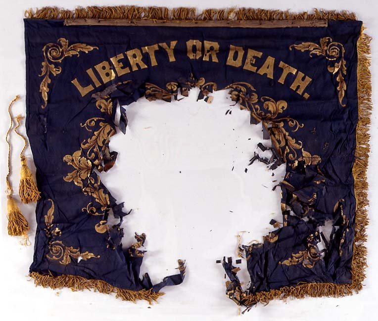 State flag from the 15th Virginia Cavalry. Many of the flags in the collection of the American Civil War Museum were damaged over time.