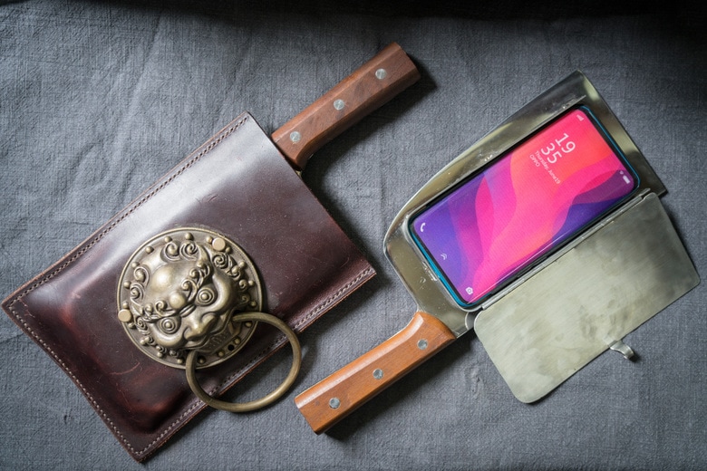 Cellphone cases designed to look like meat cleavers are Geng Shuaiâs hottest product. Heâs sold 10. (Yan Cong / The Washington Post)
