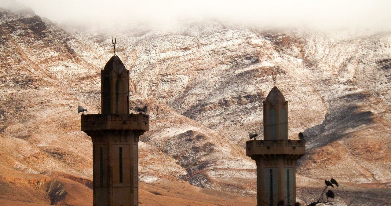 PIC BY Karim Bouchetata/Geoff Robinson Photography 07976 880732. Picture taken on December 19th 2016 shows the snow in the Sahara desert near the town of Ain Sefra,Algeria. England is not set to have a white Christmas - but SNOW has fallen in the SAHARA desert for only the SECOND time in living memory. Amateur photographer Karim Bouchetata took incredible pictures of snow covering the sand in the small Saharan desert town of Ain Sefra,Algeria, yesterday afternoon (Mon). He captured the amazing moment snow fell on the red sand dunes in the world's largest hot desert for the first time in 37 YEARS. Snow was last seen in Ain Sefra, known as 