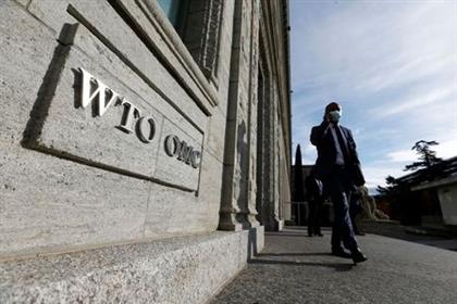 A delegate arrives before a meeting at the World Trade Organization (WTO) in Geneva, Switzerland, October 28, 2020. REUTERS/Denis Balibouse A delegate arrives before a meeting at the World Trade Organization (WTO) in Geneva, Switzerland, October 28, 2020. REUTERS/Denis Balibouse