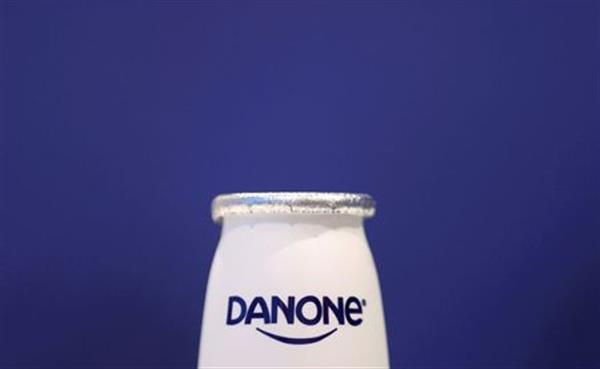 FILE PHOTO: A company logo is seen on a product displayed before French food group Danone's 2019 annual results presentation in Paris, France, February 26, 2020. REUTERS/Christian Hartmann/File Photo 