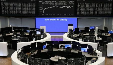 FILE PHOTO: The German share price index DAX graph is pictured at the stock exchange in Frankfurt, Germany, March 22, 2021. REUTERS/Staff FILE PHOTO: The German share price index DAX graph is pictured at the stock exchange in Frankfurt, Germany, March 22, 2021. REUTERS/Staff