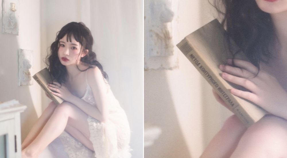 Оказывается, азиатки любят фотографироваться с советскими книгами. Выглядит странно