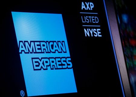 American Express logo and trading symbol are displayed on a screen at the New York Stock Exchange (NYSE) in New York, U.S., December 6, 2017. REUTERS/Brendan McDermid American Express logo and trading symbol are displayed on a screen at the New York Stock Exchange (NYSE) in New York, U.S., December 6, 2017. REUTERS/Brendan McDermid