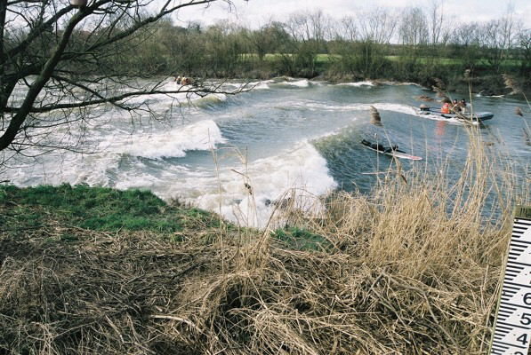 Surfers on the Severn bore.