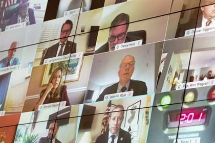 Members of the House Financial Services Committee are seen remotely during a hearing on "Oversight of the Treasury Department's and Federal Reserve's Pandemic Response" in the Rayburn House Office Building in Washington, U.S., December 2, 2020. Greg Nash/Pool via REUTERS  Members of the House Financial Services Committee are seen remotely during a hearing on "Oversight of the Treasury Department's and Federal Reserve's Pandemic Response" in the Rayburn House Office Building in Washington, U.S., December 2, 2020. Greg Nash/Pool via REUTERS