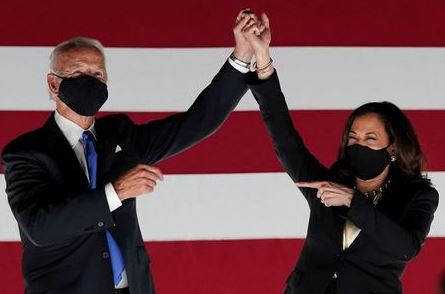 Democratic presidential candidate and former Vice President Joe Biden and U.S. Senator and Democratic candidate for Vice President Kamala Harris celebrate outside the Chase Center after Biden accepted the 2020 Democratic presidential nomination during the largely virtual 2020 Democratic National Convention, in Wilmington, Delaware, U.S., August 20, 2020. REUTERS/Kevin Lamarque Democratic presidential candidate and former Vice President Joe Biden and U.S. Senator and Democratic candidate for Vice President Kamala Harris celebrate outside the Chase Center after Biden accepted the 2020 Democratic presidential nomination during the largely virtual 2020 Democratic National Convention, in Wilmington, Delaware, U.S., August 20, 2020. REUTERS/Kevin Lamarque