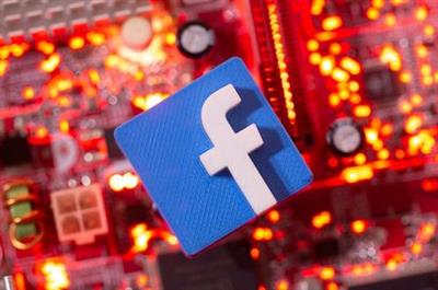 FILE PHOTO: A 3D printed Facebook logo is placed on a computer motherboard in this illustration taken January 21, 2021. REUTERS/Dado Ruvic/Illustration/File Photo