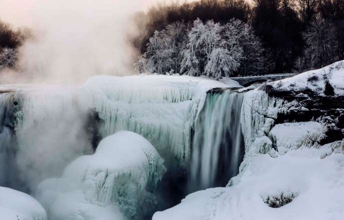 A partially frozen Niagara Falls is seen on the American side during sub freezing temperatures in Niagara Falls on March 3, 2014.