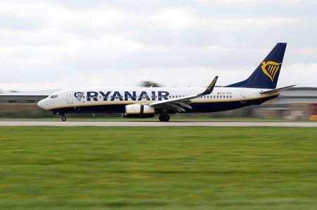 A Ryanair aircraft lands on the southern runway at Gatwick Airport in Crawley, Britain, August 25, 2021. REUTERS/Peter Nicholls A Ryanair aircraft lands on the southern runway at Gatwick Airport in Crawley, Britain, August 25, 2021. REUTERS/Peter Nicholls