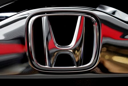 FILE PHOTO: Honda's logo on its Modulo model is pictured at its showroom at its headquarters in Tokyo, Japan, February 19, 2019. REUTERS/Kim Kyung-hoon FILE PHOTO: Honda's logo on its Modulo model is pictured at its showroom at its headquarters in Tokyo, Japan, February 19, 2019. REUTERS/Kim Kyung-hoon