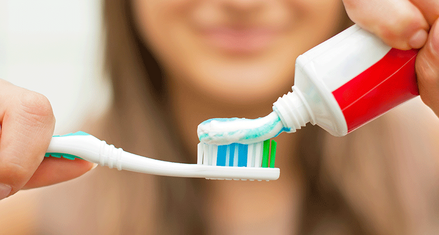 toothpaste on toothbrush