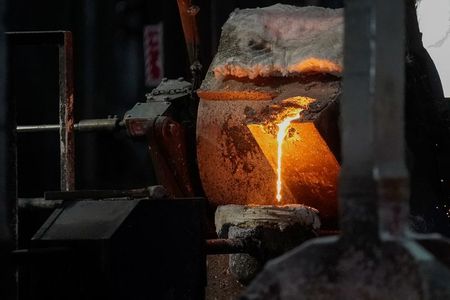 Molten metal is poured into carbon anodes at Century Aluminum Company in Hawesville, Kentucky, U.S. May 14, 2019. Picture taken May 14, 2019. REUTERS/Bryan Woolston Molten metal is poured into carbon anodes at Century Aluminum Company in Hawesville, Kentucky, U.S. May 14, 2019. Picture taken May 14, 2019. REUTERS/Bryan Woolston