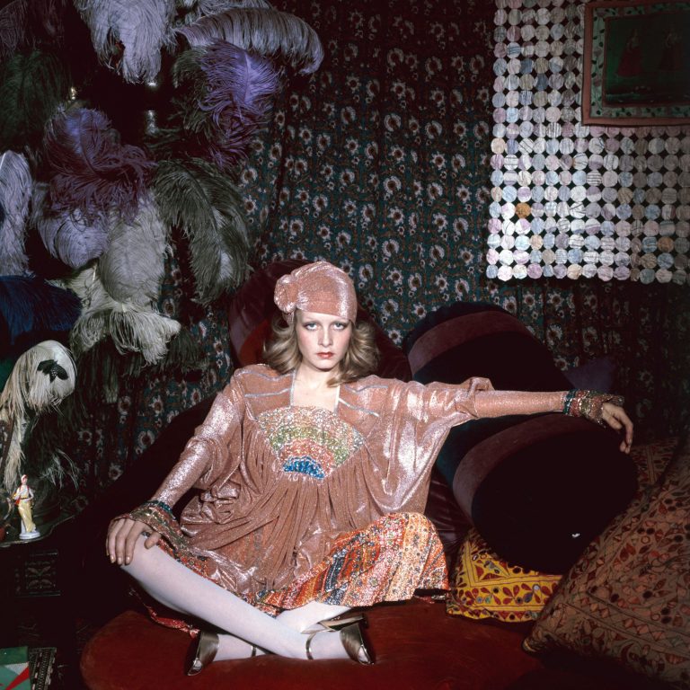 Twiggy-sits-cross-legged-in-an-exotic-tent-constructed-in-Justin-de-Villeneuve’s-home-1972-Justin-de-Villeneuve-768x768.jpg