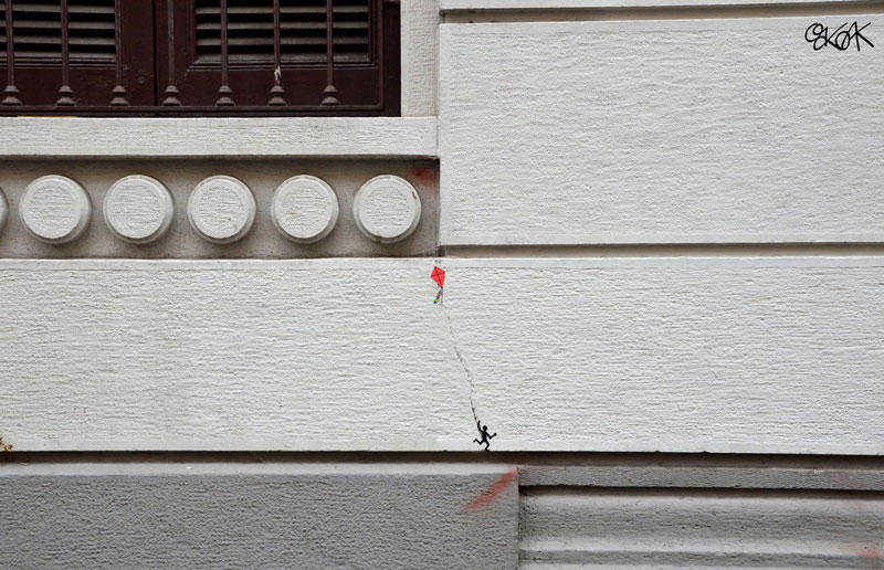 Уличное искусство, играющее с окружающей средой