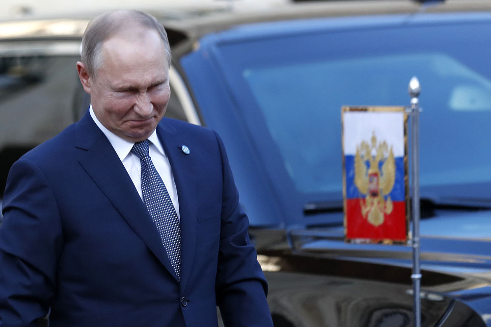 Мимика Зеленского и Путина при встрече в Париже: говорящие кадры