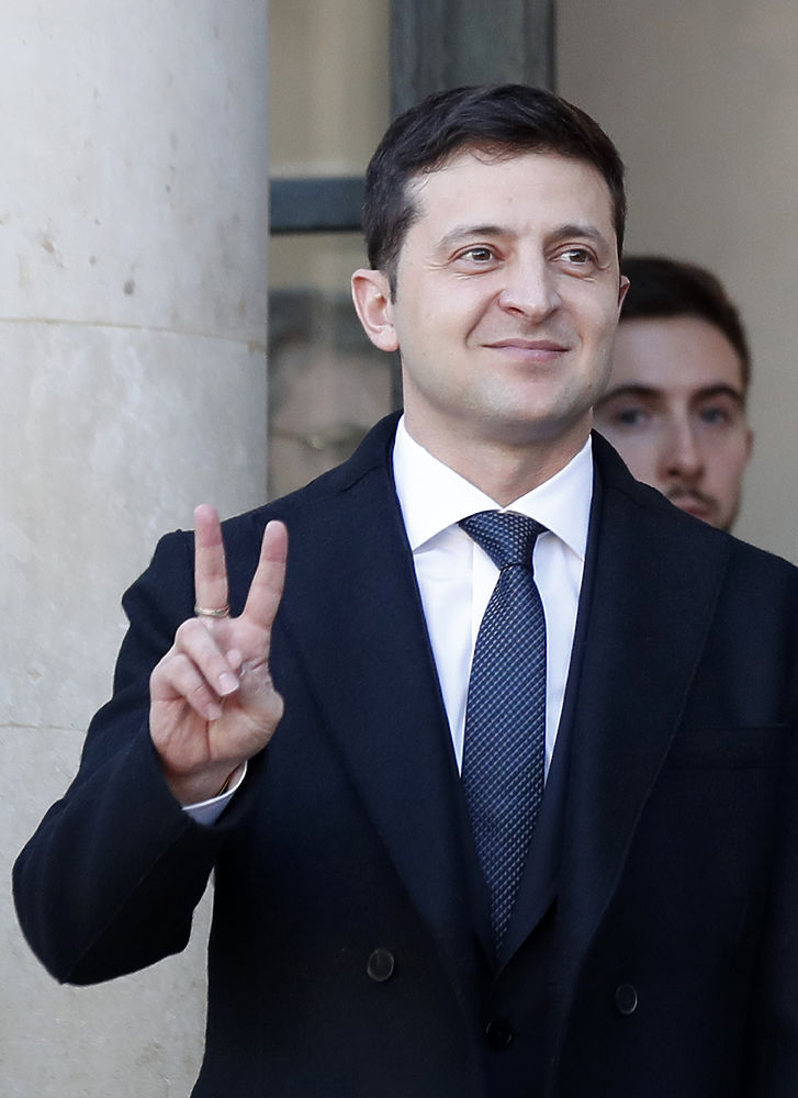 Мимика Зеленского и Путина при встрече в Париже: говорящие кадры