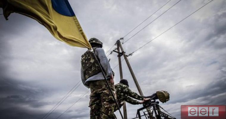 Военные и флаг Украины закон о “реинтеграции” Донбасса