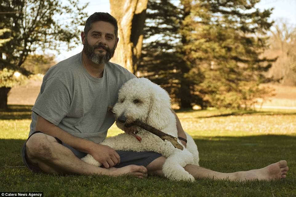 The real deal: Mr Cline cuddles up to his pet pal in a non-edited photograph of the pair together