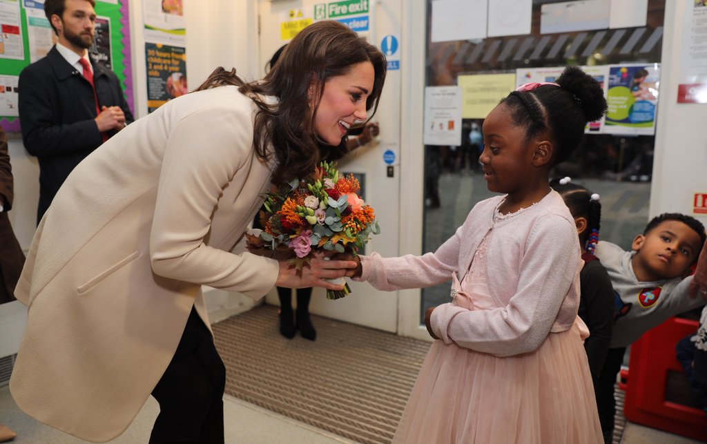 Kate Middleton Cleverly Conceals Her Growing Belly During a Day With Children