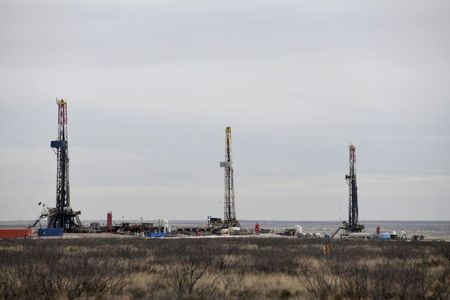 Drilling rigs operate in the Permian Basin oil and natural gas production area in Lea County, New Mexico, U.S., February 10, 2019. Picture taken February 10, 2019. REUTERS/Nick Oxford Drilling rigs operate in the Permian Basin oil and natural gas production area in Lea County, New Mexico, U.S., February 10, 2019. Picture taken February 10, 2019. REUTERS/Nick Oxford