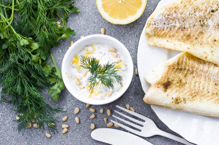 Невероятно вкусный сметанный соус с лимоном, зеленью и оливковым маслом. \ Фото: ru.depositphotos.com. Невероятно вкусный сметанный соус с лимоном, зеленью и оливковым маслом. \ Фото: ru.depositphotos.com.