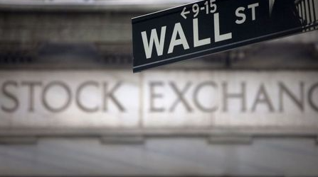 A Wall Street sign is pictured outside the New York Stock Exchange in New York, October 28, 2013. REUTERS/Carlo Allegri (UNITED STATES - Tags: BUSINESS) A Wall Street sign is pictured outside the New York Stock Exchange in New York, October 28, 2013. REUTERS/Carlo Allegri (UNITED STATES - Tags: BUSINESS)