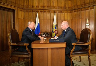 С временно исполняющим обязанности губернатора города Севастополя Михаилом Развожаевым.