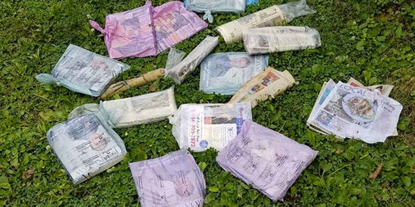 Мужчина устанавливает камеру ночного видения, чтобы узнать, кто приносит ему газеты