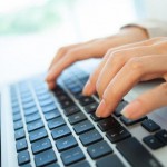 woman-typing-on-a-computer-keyboard-745X401-745x400