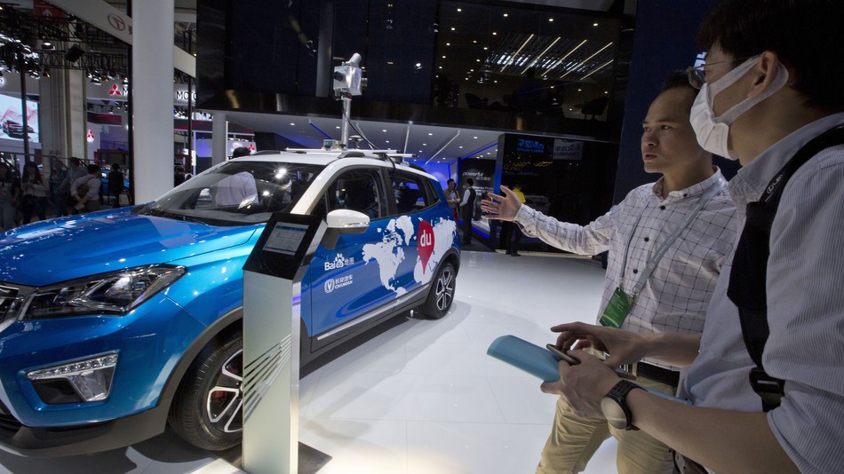 A car equipped with Baidu's mapping tech is shown off at the 2016 Auto China show.