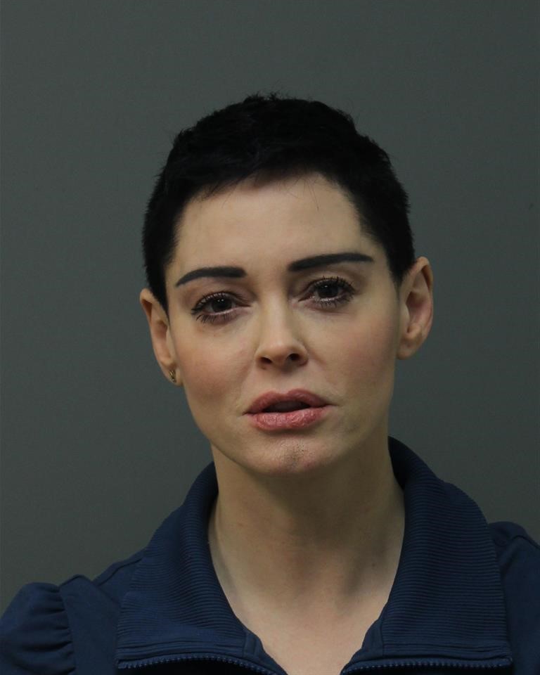 In this handout photo provided by the Loudoun County Sheriff's Office, Rose McGowan appears in a booking photo in Loudoun County, Va. on Nov. 14, 2017.