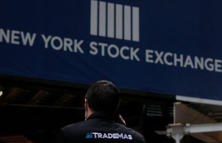 Trader Frank Masiello talks on his phone on Wall St. outside the New York Stock Exchange (NYSE) in New York, U.S., January 15, 2021. REUTERS/Brendan McDermid Trader Frank Masiello talks on his phone on Wall St. outside the New York Stock Exchange (NYSE) in New York, U.S., January 15, 2021. REUTERS/Brendan McDermid