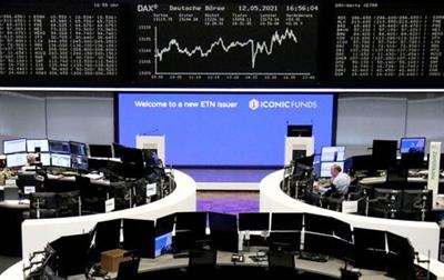FILE PHOTO: The German share price index DAX graph is pictured at the stock exchange in Frankfurt, Germany, May 12, 2021. REUTERS/Staff
