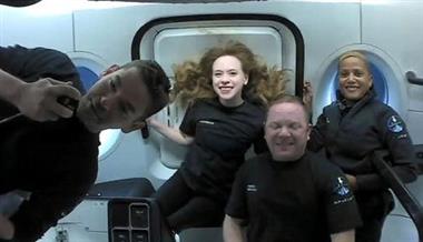 Inspiration4 crew Jared Isaacman, Sian Proctor, Hayley Arceneaux, and Chris Sembroski, seen on their first day in space in this handout photo released on September 17, 2021. SpaceX/Handout via REUTERS Inspiration4 crew Jared Isaacman, Sian Proctor, Hayley Arceneaux, and Chris Sembroski, seen on their first day in space in this handout photo released on September 17, 2021. SpaceX/Handout via REUTERS