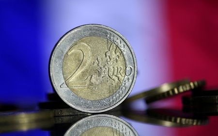 FILE PHOTO: Euro coins are seen in front of displayed France flag in this picture illustration taken May 7, 2017. REUTERS/Dado Ruvic/Illustration/File Photo FILE PHOTO: Euro coins are seen in front of displayed France flag in this picture illustration taken May 7, 2017. REUTERS/Dado Ruvic/Illustration/File Photo