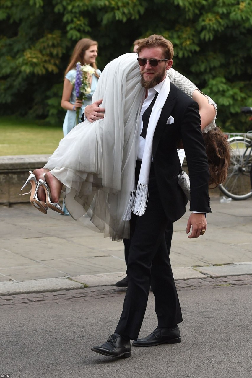One guest was kind enough to sling his female friend over his shoulder as the effect of her heels began to kick in