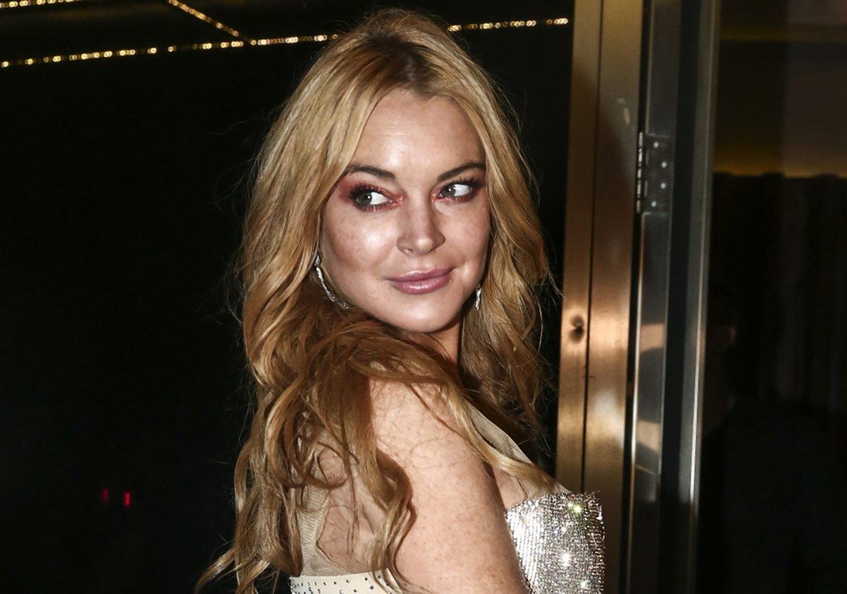 Lindsay Lohan urged her Twitter followers to quit bullying President Trump.