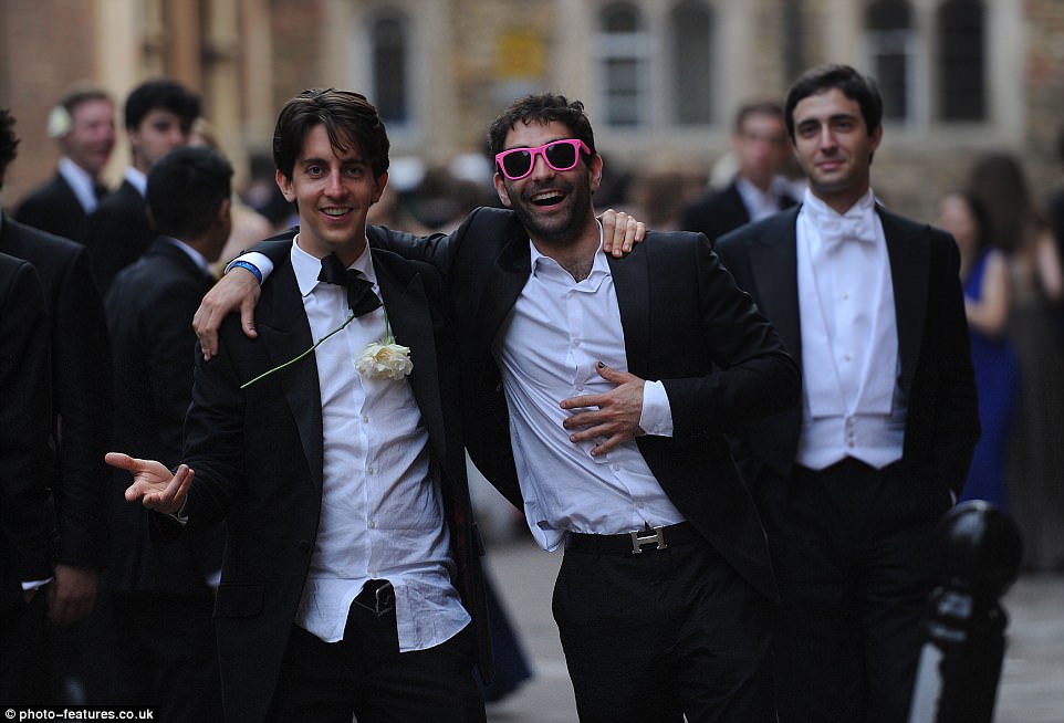 Lavish affair: Guests were treated to a five-course meal served in Trinity Great Hall, then students could tuck in to oysters, a hog roast and a chocolate fountain, while drinks were served from a floating punt on the river