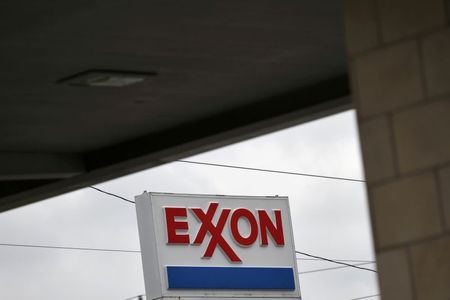 FILE PHOTO: An Exxon gas station is seen in Houston, Texas, U.S., April 30, 2019. REUTERS/Loren Elliott/File Photo FILE PHOTO: An Exxon gas station is seen in Houston, Texas, U.S., April 30, 2019. REUTERS/Loren Elliott/File Photo