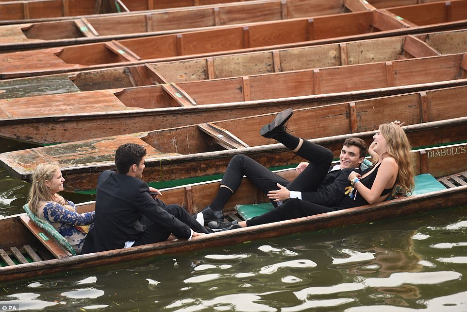 Is that a good idea? After partying the night away, guests try their hand at punting on the River Cam