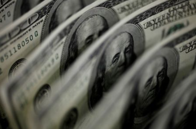 FILE PHOTO: A picture illustration shows U.S. 100 dollar bank notes taken in Tokyo August 2, 2011. REUTERS/Yuriko Nakao/File Photo FILE PHOTO: A picture illustration shows U.S. 100 dollar bank notes taken in Tokyo August 2, 2011. REUTERS/Yuriko Nakao/File Photo